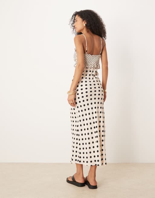 ASOS DESIGN tie front bust ruffle midi dress in polka dot print