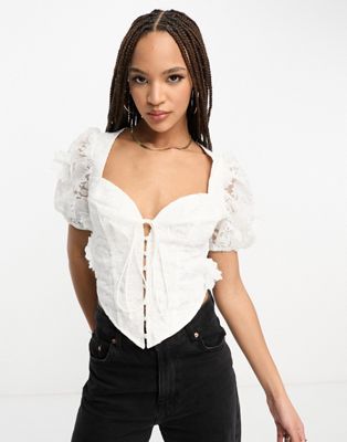 ASOS DESIGN tie front corset top with puff sleeve in white 3D floral lace