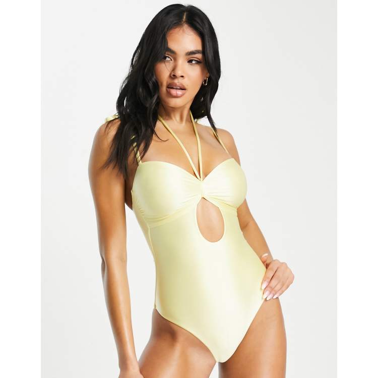 ASOS DESIGN twist front color block swimsuit in neon yellow and