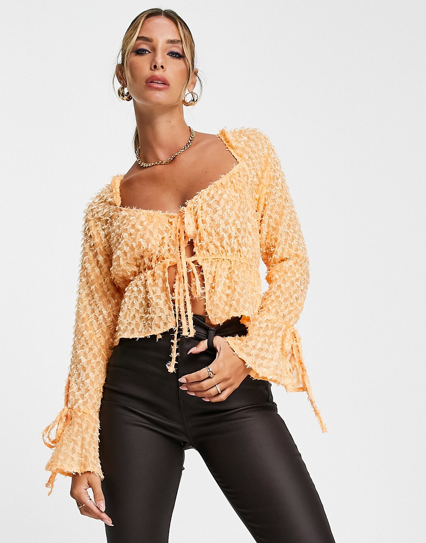 ASOS DESIGN tie front fluffy blouse with flare sleeve & corset bust in pastel orange-Multi