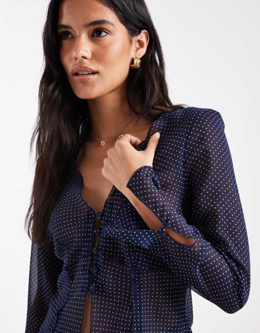 ASOS DESIGN tie front long sleeve chiffon blouse in polka dot
