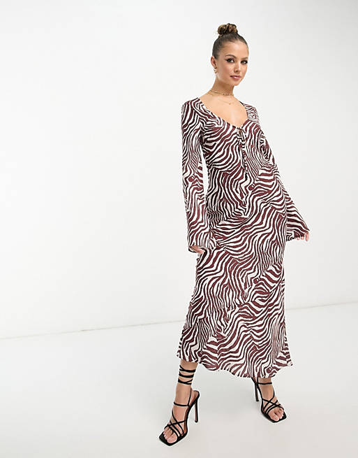 hele Trafik Cater ASOS DESIGN tie front long sleeve midi dress in zebra print | ASOS