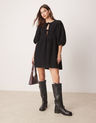 tie front mini dress in corduroy in black