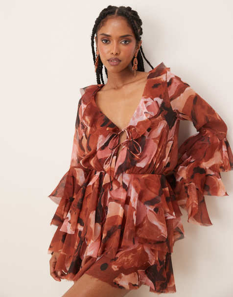 ASOS DESIGN tie front ruffle detail long sleeve playsuit in abstract print - view 1