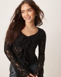 [ASOS DESIGN] ASOS DESIGN tie front ruffle detail textured lace top in black XS Black