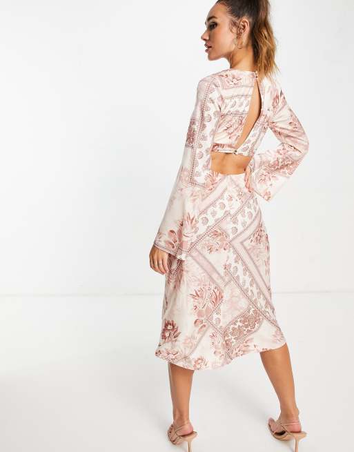 asos design satin tie front midi dress ASOS DESIGN tie front satin midi dress with flared sleeve and cut out side  in blush patchwork floral