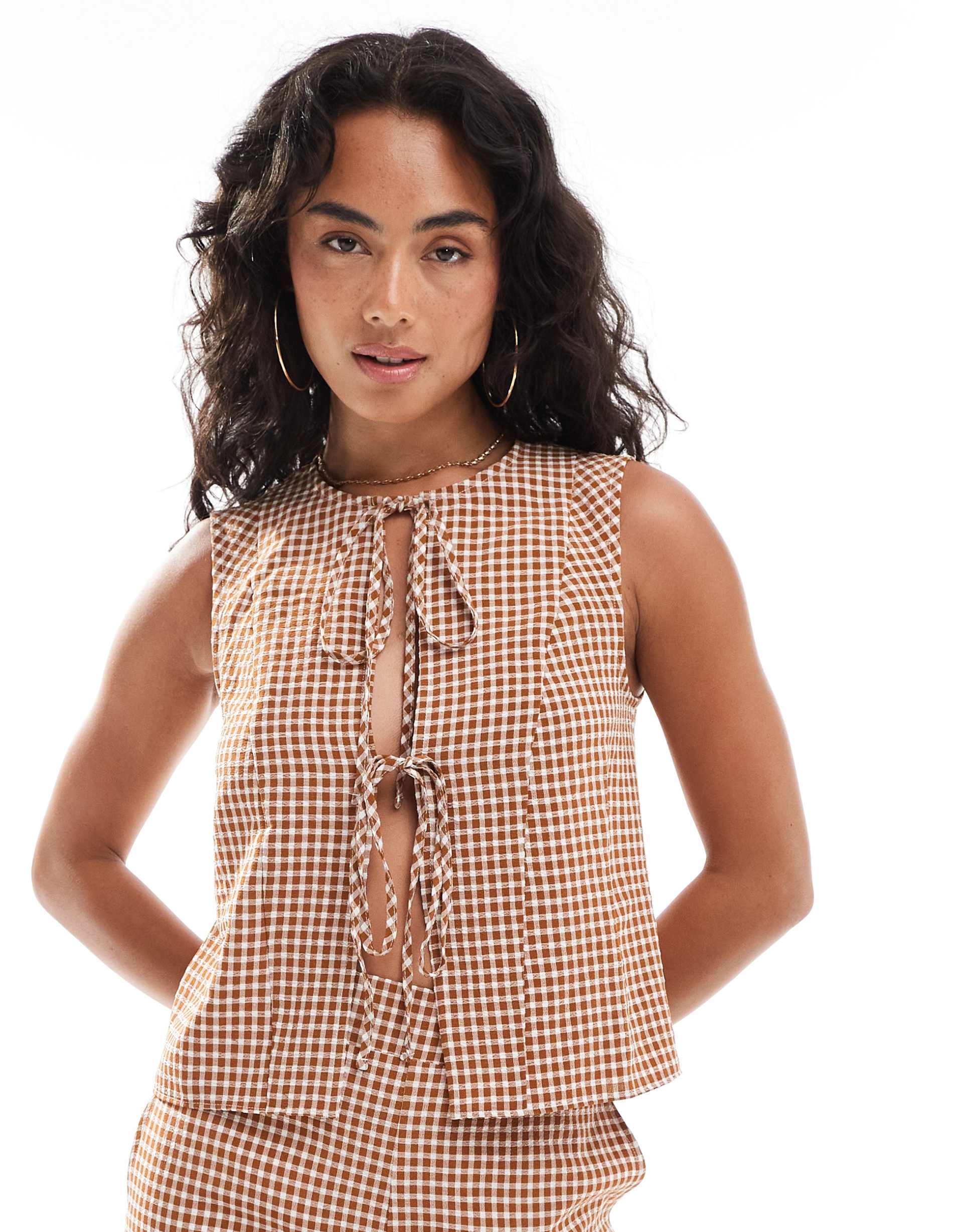 asos design tie front sleeveless peplum top in gingham