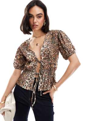 ASOS DESIGN tie front textured peplum top in leopard print