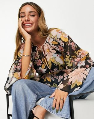 ASOS DESIGN tie neck blouse with flare sleeve and tie wrap waist in metallic floral print  - ASOS Price Checker