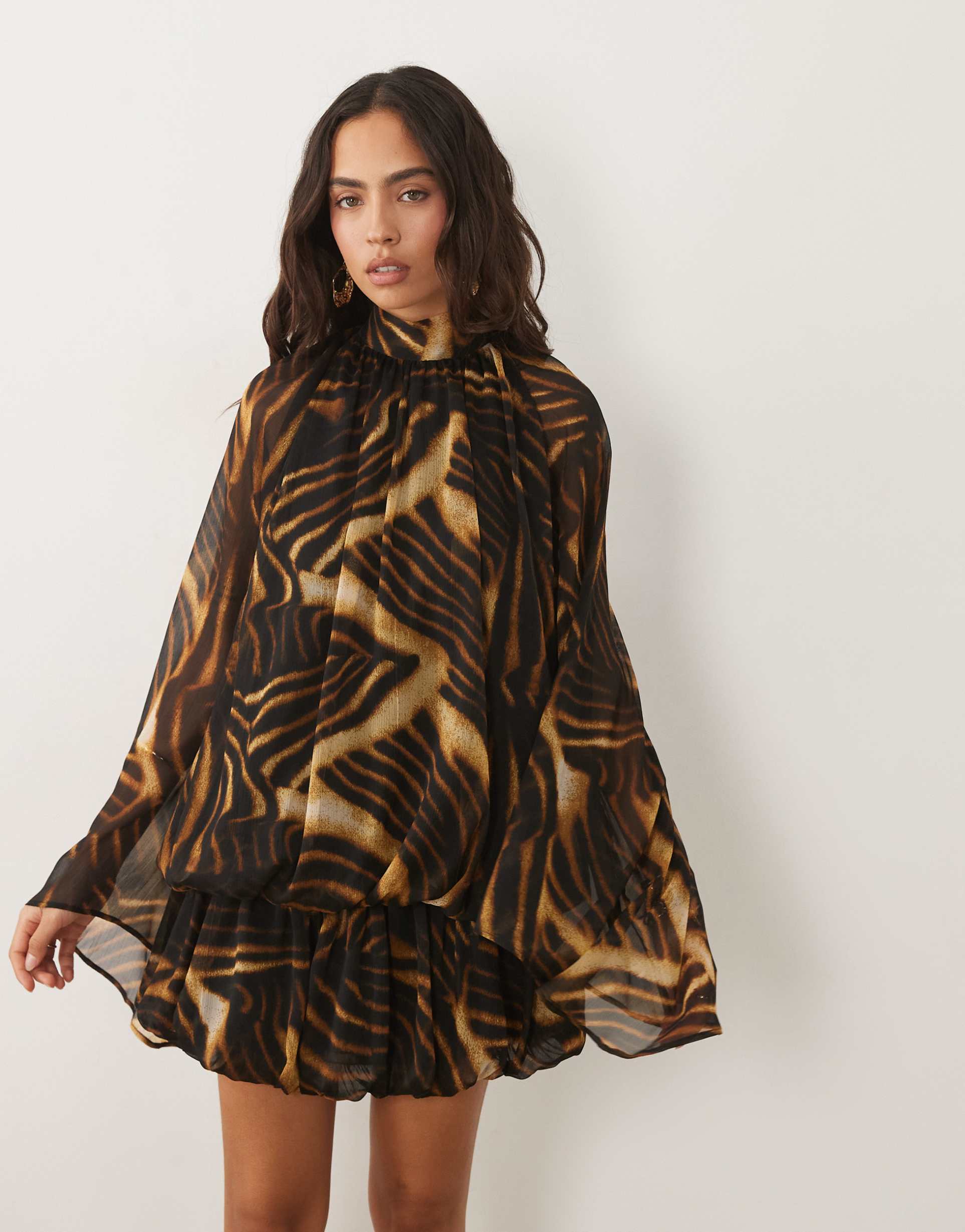 asos design tie neck bubble mini dress in abstract animal print