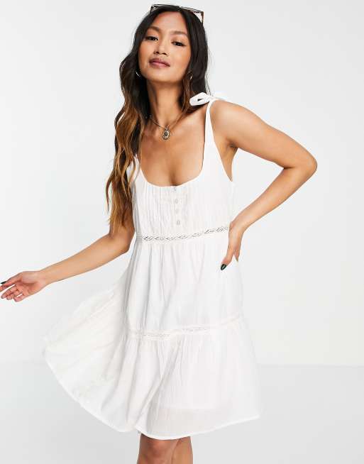 ASOS DESIGN tie shoulder lace insert smock mini sundress in white | ASOS