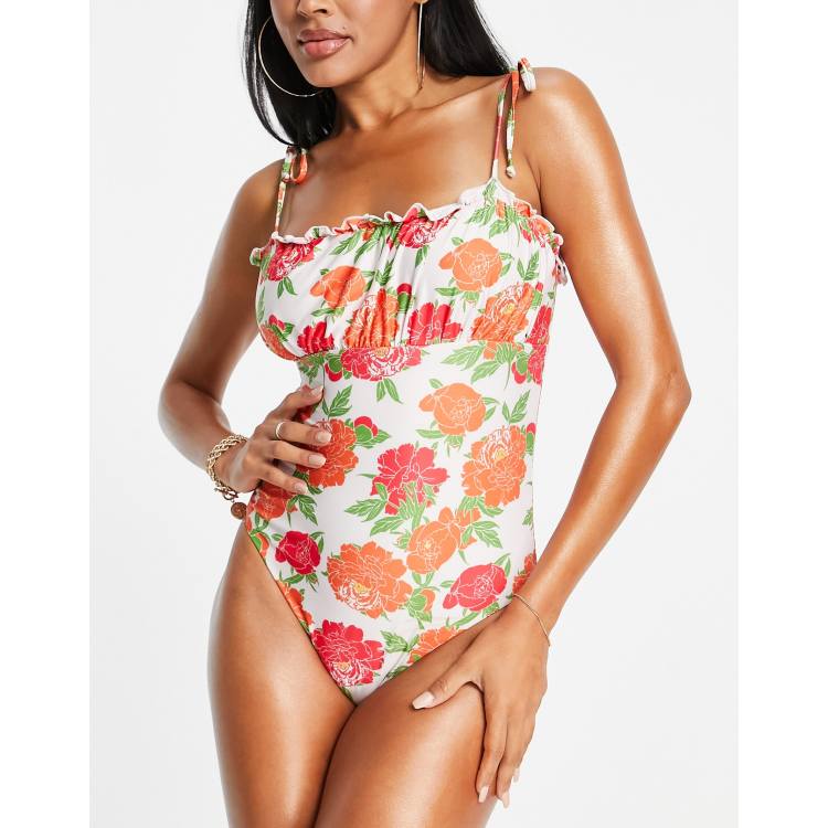 ASOS DESIGN tie shoulder lettuce edge swimsuit in bold floral print