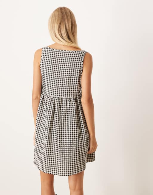 ASOS DESIGN tie sides baby doll mini dress in black gingham