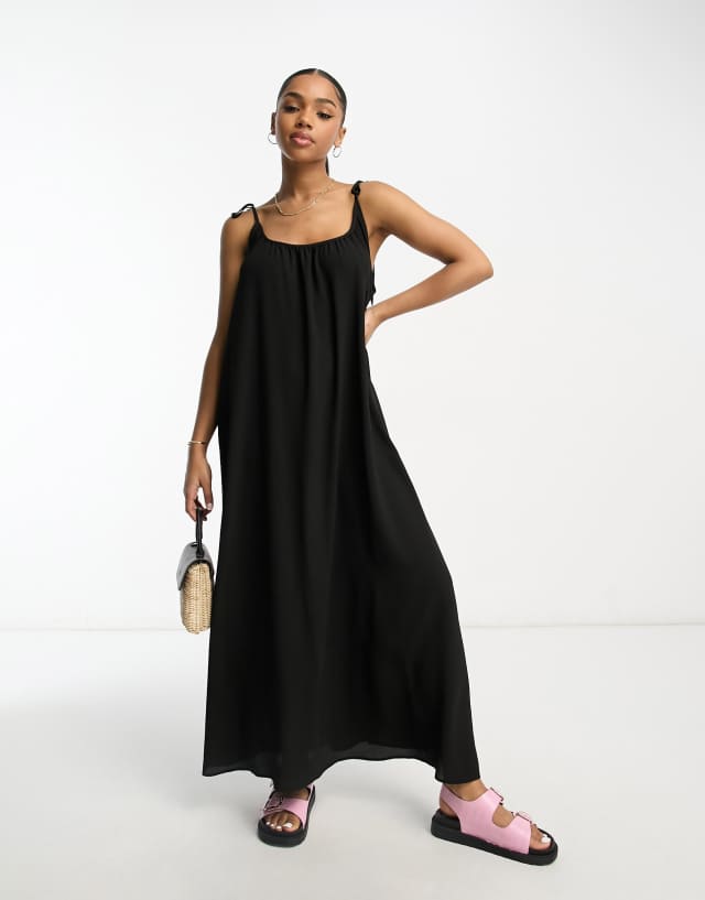 ASOS DESIGN tie strap detail trapeze maxi slip dress in black