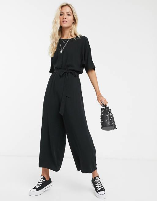 Black jumpsuit store with trainers