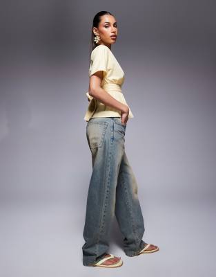 ASOS DESIGN - Lysegul ærmeløs bluse med bindetalje og åben ryg
