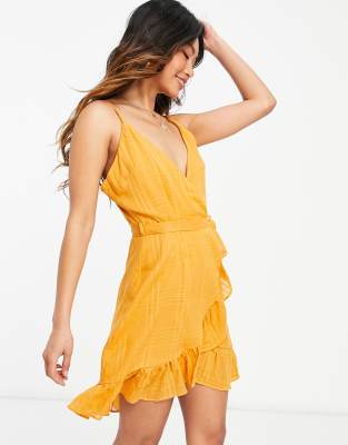 ASOS DESIGN tie wrap around mini sundress in self grid check in mustard-Yellow