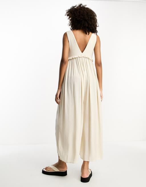 ASOS DESIGN crochet halter jumpsuit with wide leg in cream