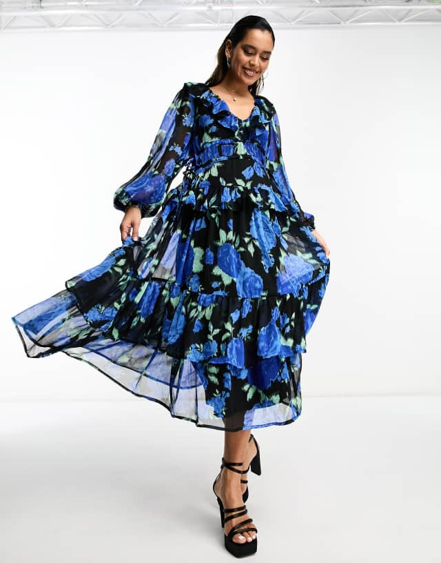 ASOS DESIGN tiered maxi dress with frills in black based blue floral print