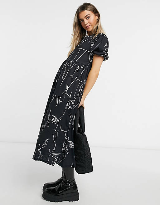  tiered midi smock dress with graphic face outline print in black 