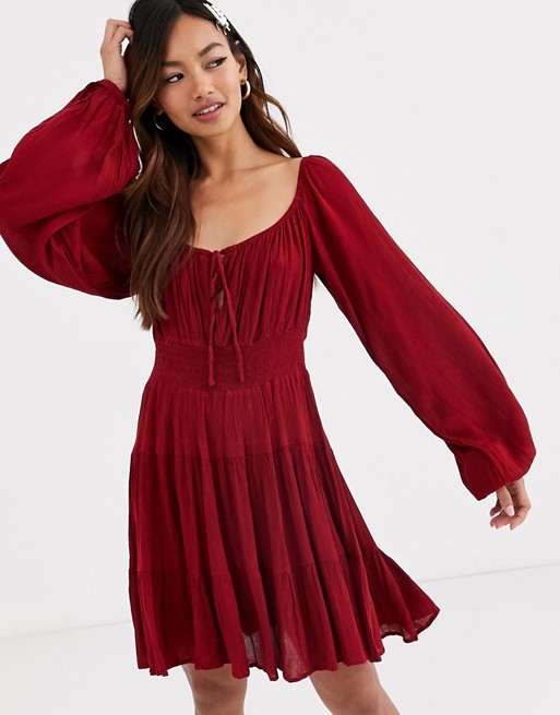 ASOS DESIGN tiered mini skater dress with shirred waist and long sleeves