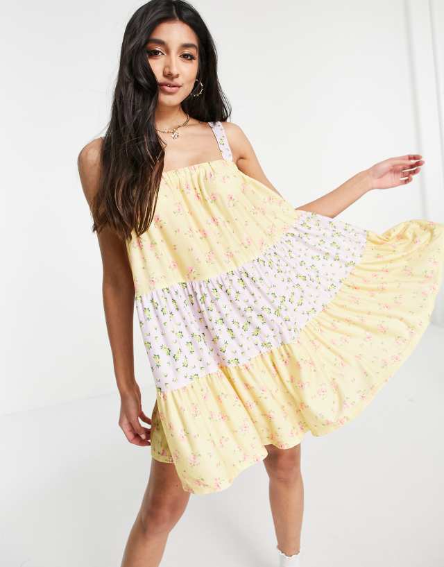 ASOS DESIGN tiered mini strappy sundress in pastel mix match floral print