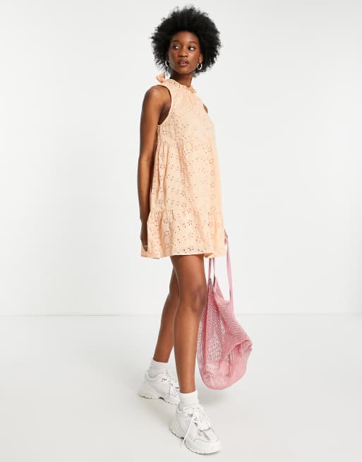 ASOS DESIGN tiered trapeze mini dress in peach contrast stitch broderie