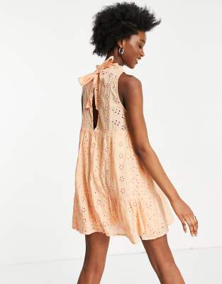 tiered trapeze mini dress in broderie