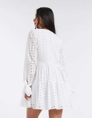 asos design petite tiered trapeze mini dress in broderie