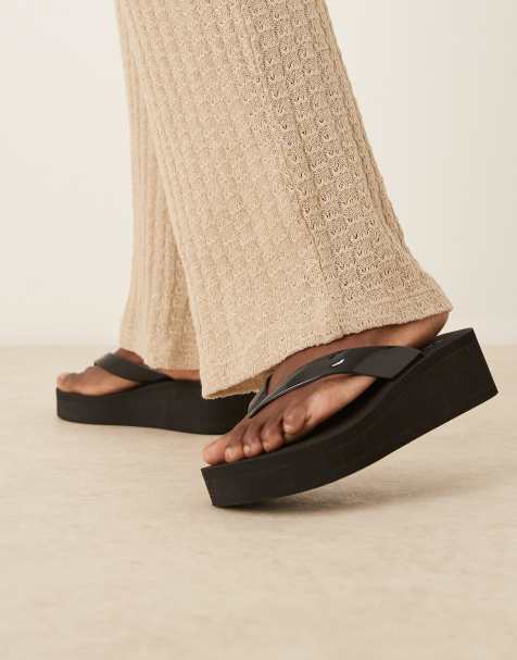 ASOS DESIGN Tigerlily toe thong wedges in black - view 1
