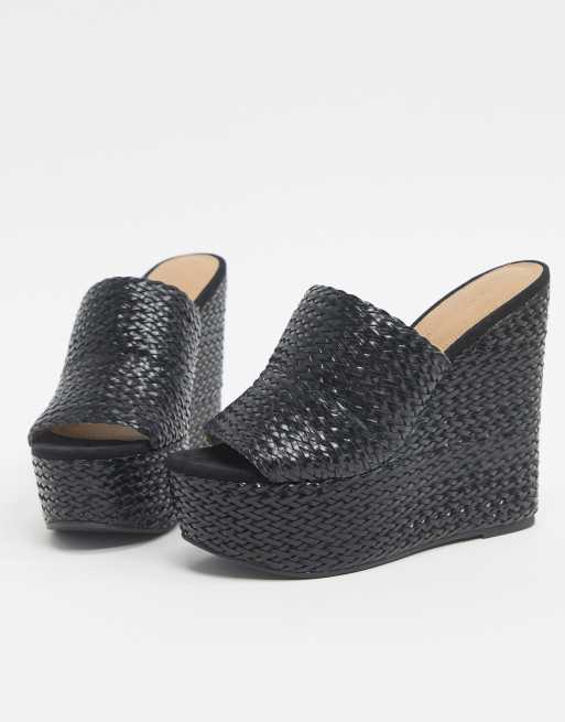 ASOS DESIGN Title Mules tress es et compens es Noir