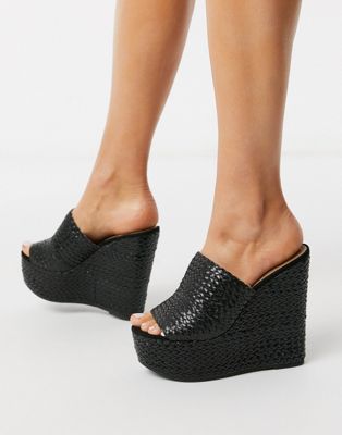 ASOS DESIGN Title woven wedge mules in 