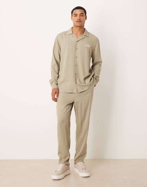 ASOS DESIGN - Toelopende broek in bruin, deel van co-ord set