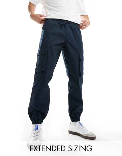ASOS DESIGN - Toelopende broek met elastische taille in donker marineblauw - view 1