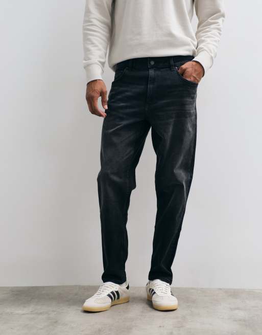 ASOS DESIGN - Toelopende jeans met stretch in verwassen zwart, 2 van 5
