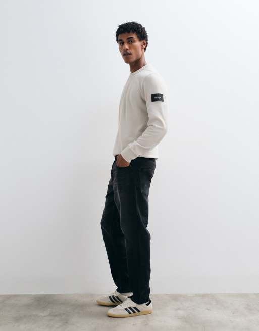 ASOS DESIGN - Toelopende jeans met stretch in verwassen zwart, 3 van 5