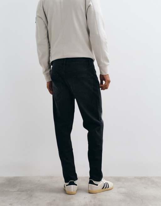 ASOS DESIGN - Toelopende jeans met stretch in verwassen zwart, 5 van 5