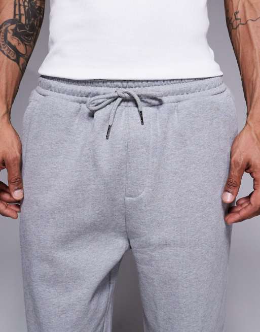 ASOS DESIGN - Toelopende joggingbroek met geribbelde boorden in gemêleerd grijs , 5 van 5