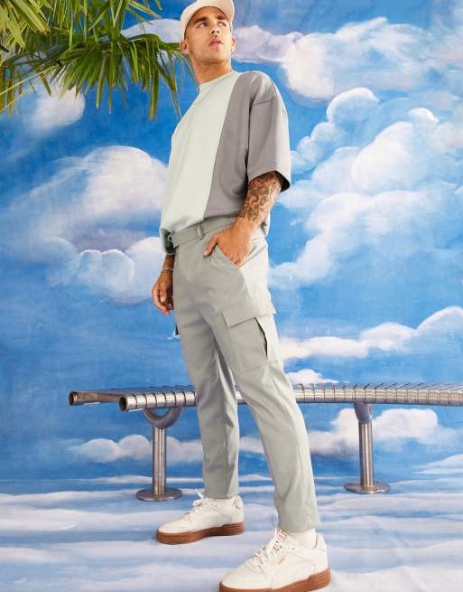 ASOS DESIGN - Toelopende nette pantalon met cargozakken in olijfgroen