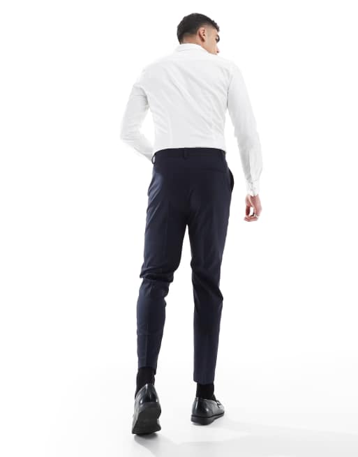ASOS DESIGN - Toelopende pantalon met elastische taille in donker marineblauw, 2 van 5