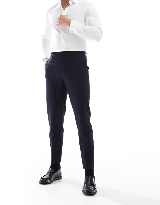ASOS DESIGN - Toelopende pantalon met elastische taille in donker marineblauw, 4 van 5