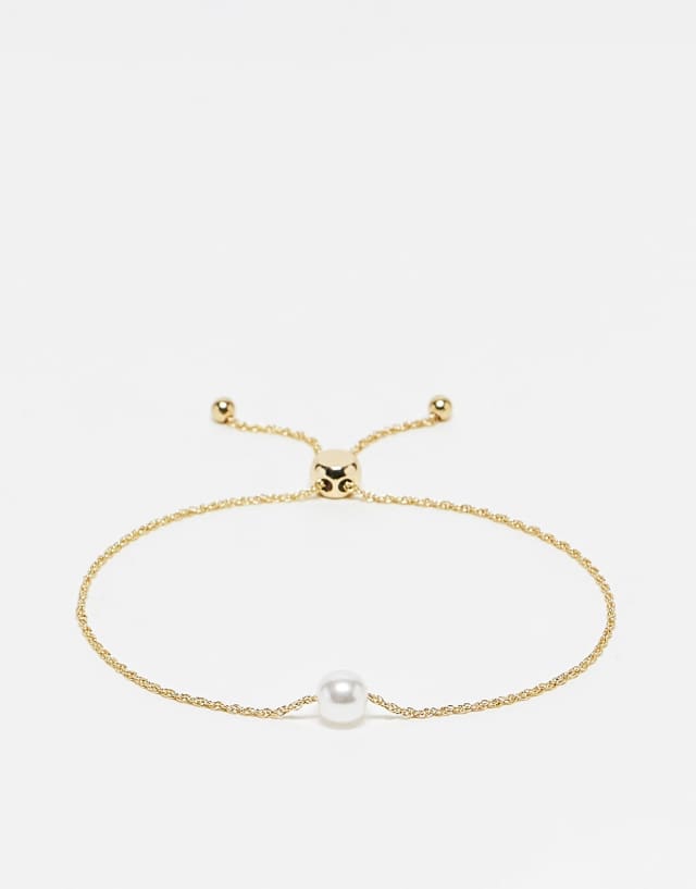 ASOS DESIGN toggle bracelet with pearl detail in gold tone