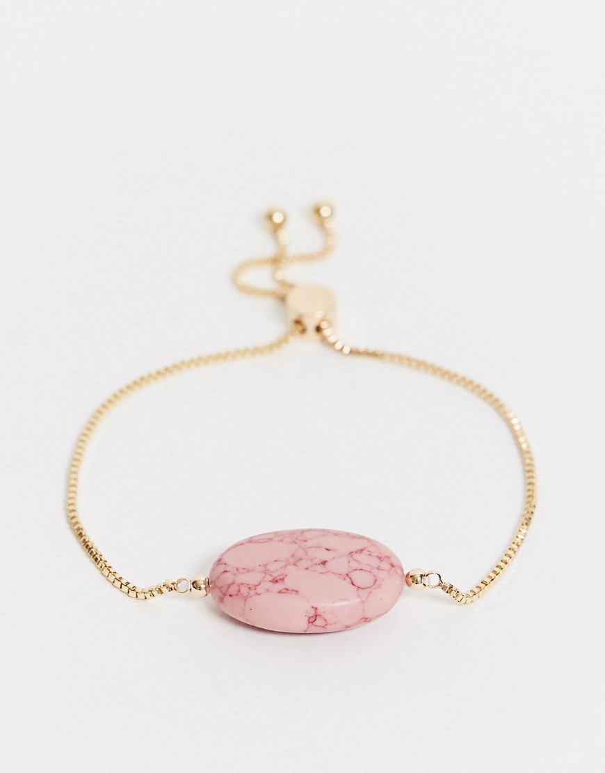 ASOS DESIGN toggle bracelet with pink semi precious stone in gold tone