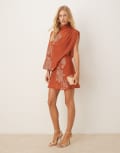 [ASOS DESIGN] ASOS DESIGN tonal embroidery high neck draped asymmetric mini dress with cut out in rust-Red 10 Rust