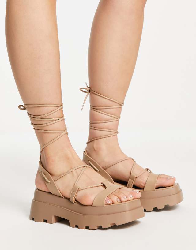 ASOS DESIGN Toni tie leg flatform sandals in taupe