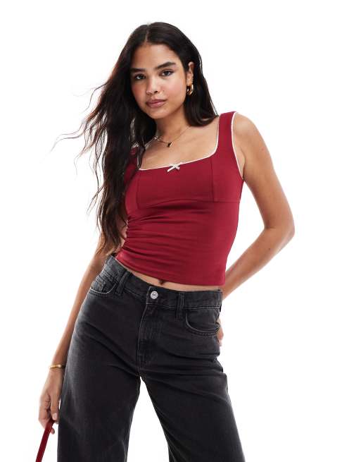 ASOS DESIGN - Top a canottiera color vino strutturato con fiocco a contrasto