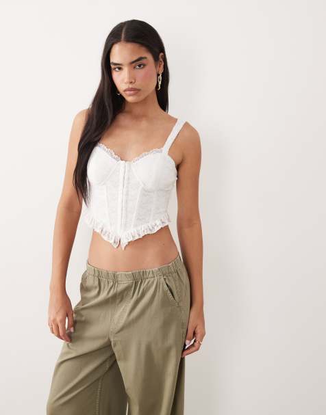 ASOS DESIGN - Top a corsetto in pizzo bianco con volant sul fondo - view 1