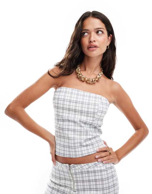 ASOS DESIGN - Top a fascia aderente a quadri in coordinato