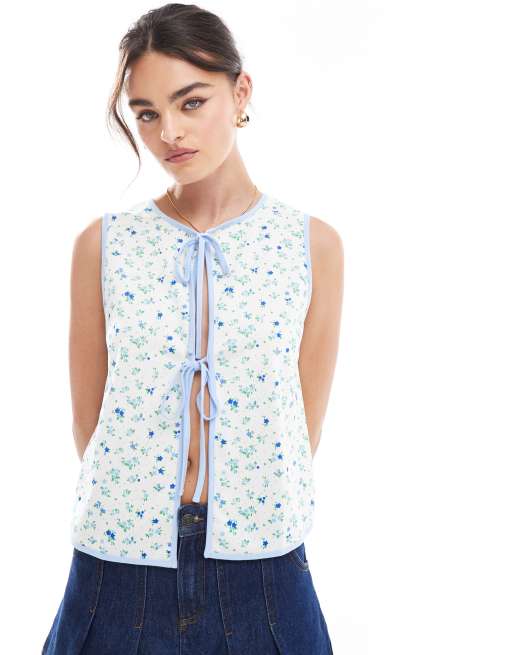 ASOS DESIGN - Top a fiori allacciato sul davanti con profili a contrasto