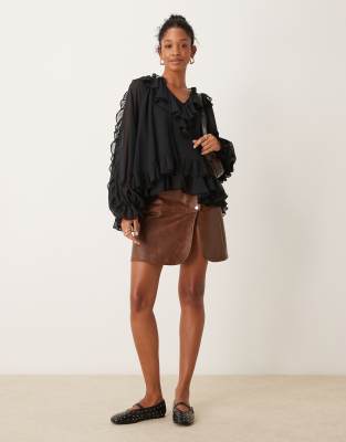 ASOS DESIGN - Top à manches longues et volants étagés - Noir | ASOS